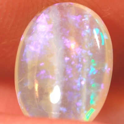 SOLID CRYSTAL OPAL Sparkles of green and purple